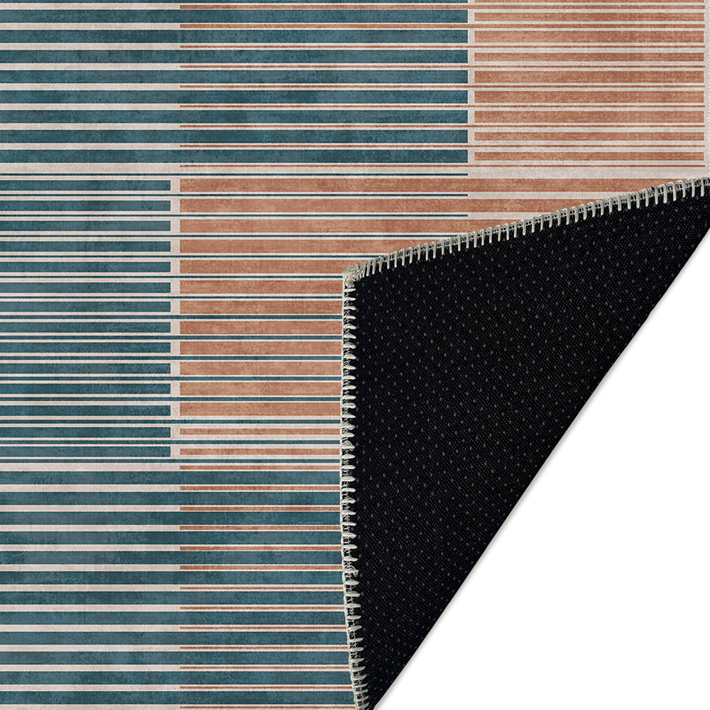 Rinnes Area Rug